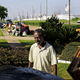 Samuel McGlory Jr. throws out debris in front of his damaged home from Hurricane Harvey in Port Arthur, Texas, in September. Photo: AP
